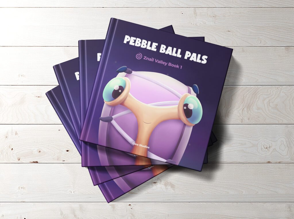 Pebble Ball Pals books stacked by Aria de Clea - children's book on a table